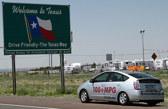 Jim Phillipi drives Texas' first Plug-in Prius across the state line