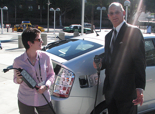 Toyota's Cindy Knight and Irv Miller in front of Toyota's Plug-in prototype, LA Auto Show, Nov 2007